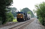 CSX 576 leads a short train L619-24 past the former Public Service gas plant (and siding)